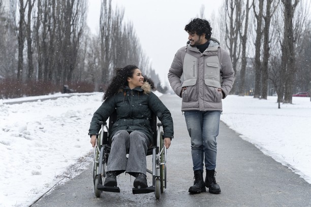 Man walking with woman for Canada Disability Benefit