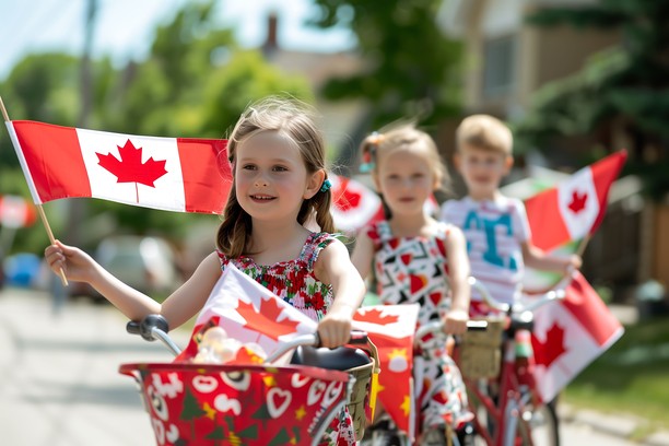 Children celebrating Canada with flags and bicycles